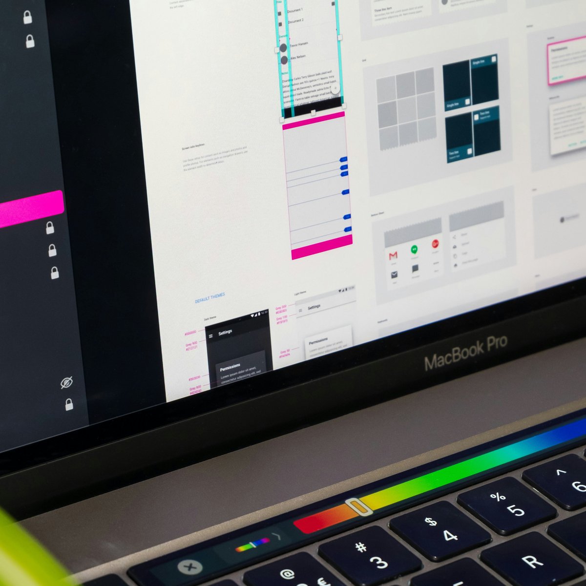 Layered UI components and device mockups representing responsive corporate web design with brand color systems